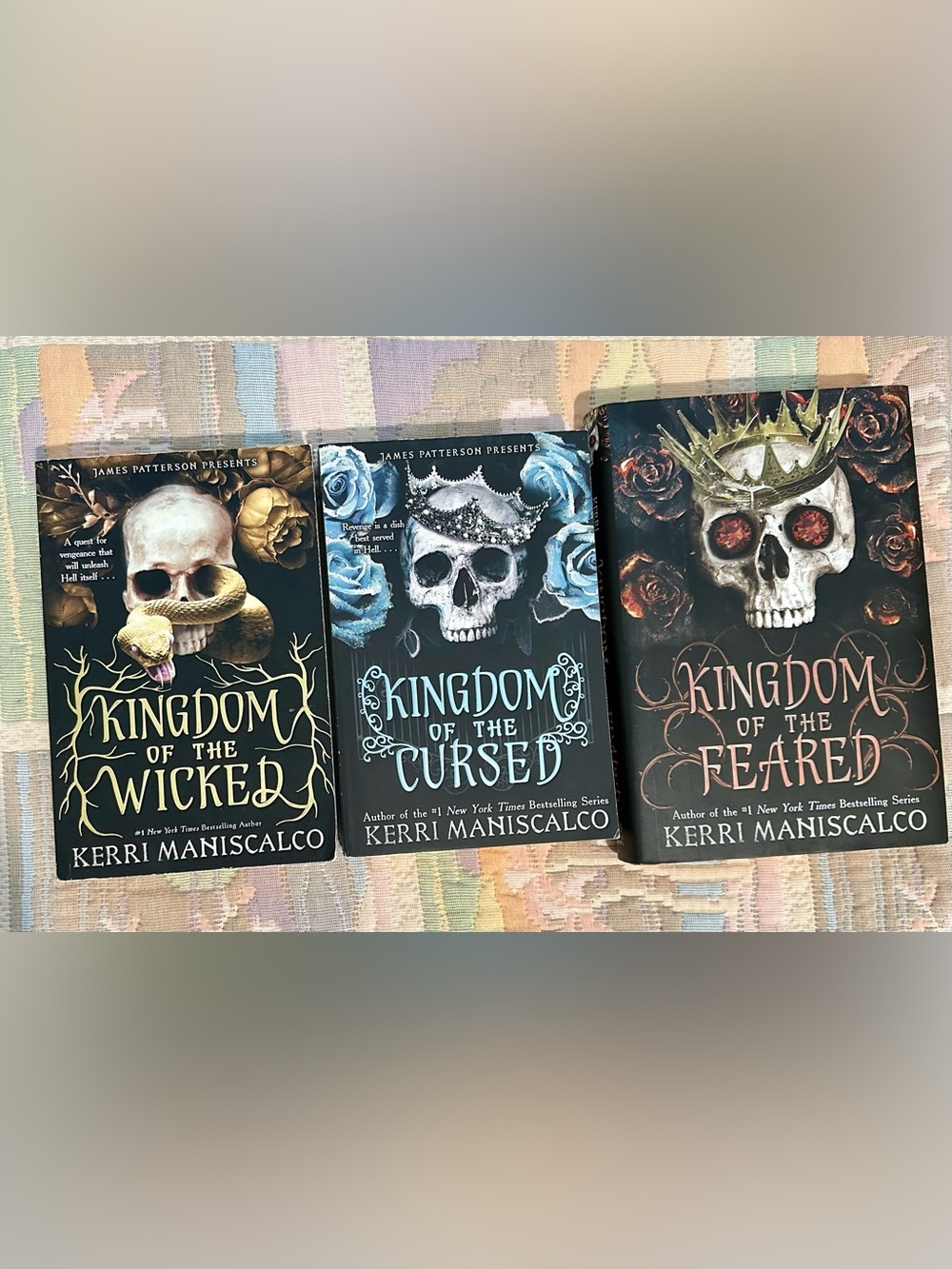 Kingdom of the Cursed by Kerri Maniscalco - Black & Light Blue Cover